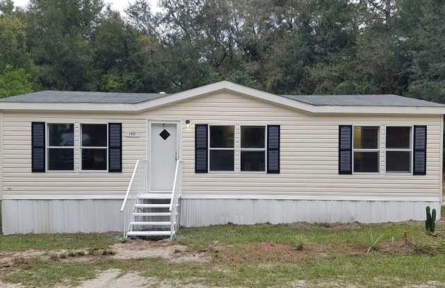 3 Bed 2 Bath w/ HUGE screen porch on partially FENCED 1/3 Acre! - 149 Northeast 171st Avenue, Marion County, FL 34488