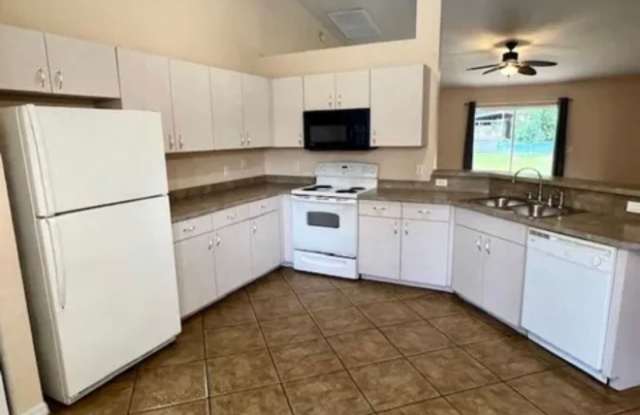 COMING SOON!  With 1,603 sq ft of living space, this 3-bedroom, 2-bath home! Gallery 4