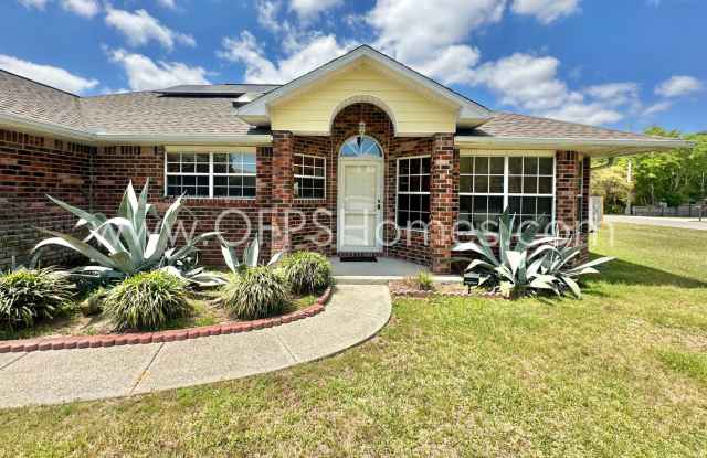 Charming 3BR/2BA Navarre Home with Flex Room, Enclosed Patio  Minutes from the Beach! photos photos