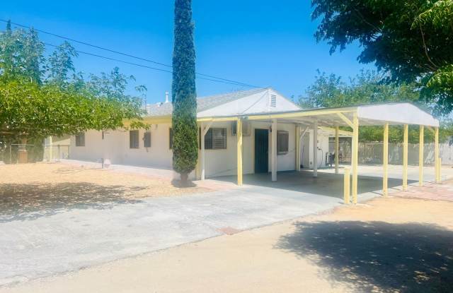 Charming 3-Bedroom Home with Wood Ceilings and Tree-Filled Surroundings – $1,900/Month photos photos