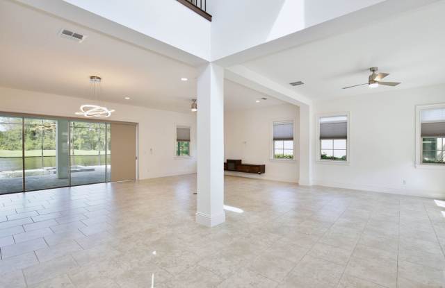 Stunning 4/5 Executive Pool Home in the Guard-Gated Golf Course Community of Eagle Creek - Orlando! Gallery 4