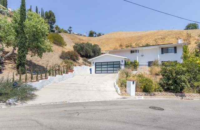 Refreshed 5-bedroom, 3-bathroom home located in the desirable Woodland Hills, CA photos photos