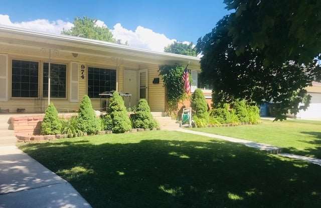 Beautiful home, new cabinets, updated carpet and paint, updated bathroom, garage and fenced backyard - shorter term lease available upon request photos photos