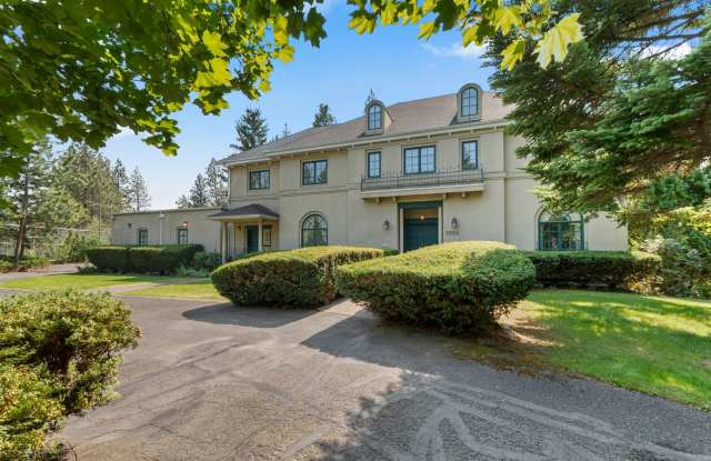 "Experience Luxury Living: Expansive 4-Bedroom Retreat Estate with Scenic Views and Elegant Finishes on Spokane's South Hill with 1.5 Acres of privacy!" photos photos