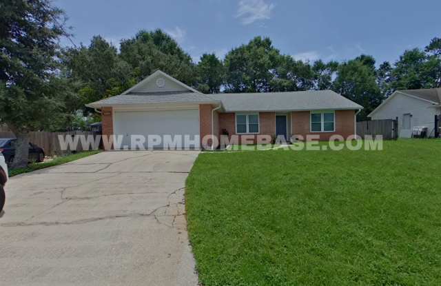 Charming 3-Bedroom Home with Brand New Windows, Garden Yard and Coffee Bar in Navarre photos photos