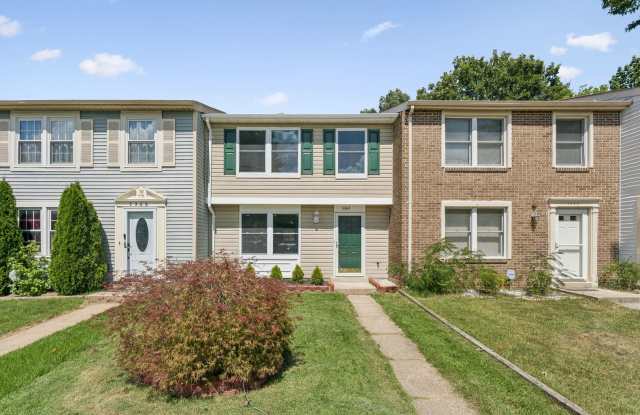 This inviting two-level townhome is perfectly situated in a highly convenient location. photos photos