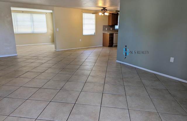 Gorgeous 2/1/1 1100 Sq. Ft. with HUGE kitchen/great room combo, tile floors throughout, BONUS ROOM a fenced in yard!!!! Gallery 4