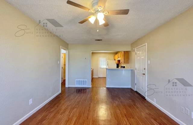Charming 2 bedroom, 1 bath home with carport and spacious back yard! Gallery 3