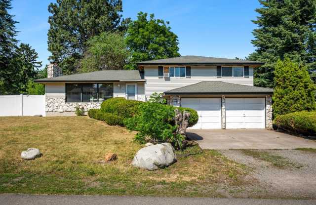 Spacious 3BR + Bonus Tri-Level in Spokane Valley - Fireplace, Corner Lot & Garage photos photos