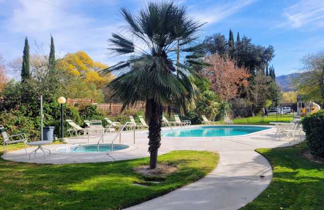 Charming 2 Bed | 1.5 Bath | 2 Car Garage Condo with Convenient Amenities! photos photos