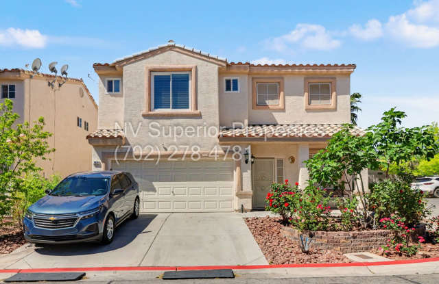 NW!! 4 Bedrooms!!! All Tile and Pergo flooring T/O!! NO Carpet!!! Low Maintenance Desert landscaping front and back!! With Patio cover in back!!! photos photos