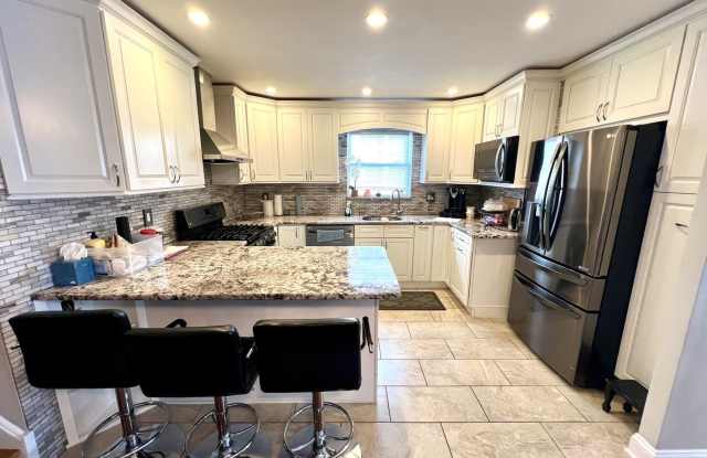 Gorgeous 4-Bedroom Townhome with One-Car Garage! Available NOW! photos photos