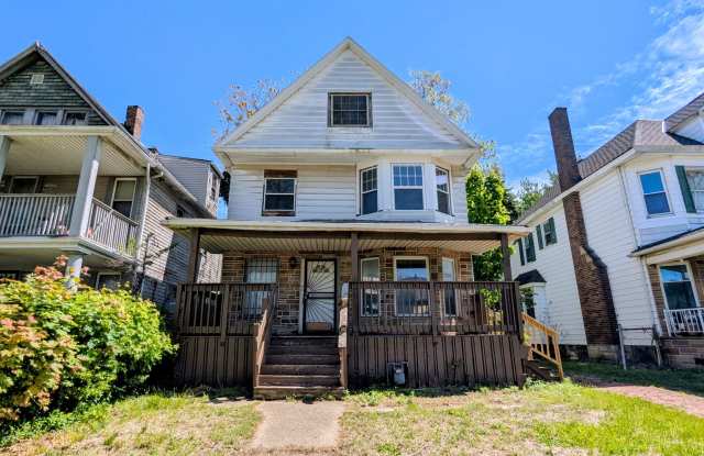Discover this four-bedroom, two-bath home in Cleveland photos photos