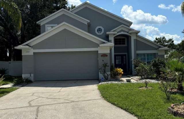 1008 WOODSONG WAY - 1008 Woodsong Way, Four Corners, FL 34714