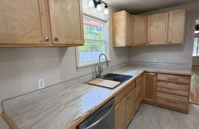 RENOVATED 3-BEDROOM HOME WITH FLEX SPACE, GARAGE & HUGE FENCED YARD Gallery 4