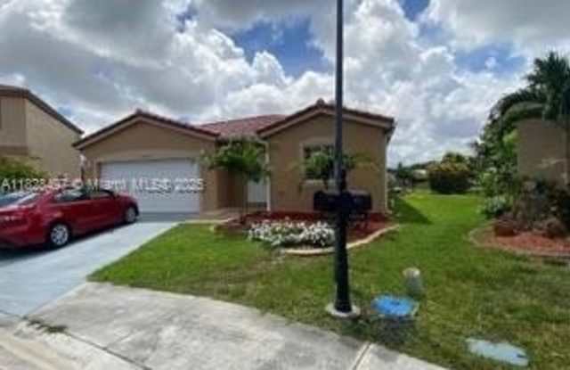 10242 SW 24th st photos photos