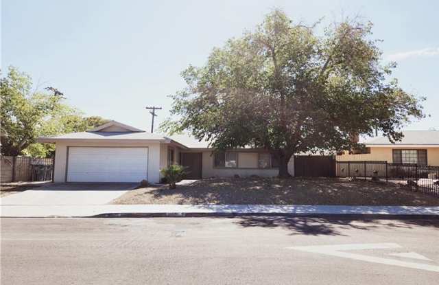 Spacious 4-Bed Home with Pool  Fireplace in 89102! photos photos
