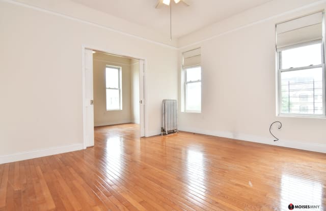215 W 116th St - 215 West 116th Street, New York City, NY 10026