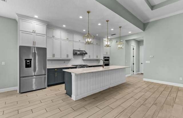 Welcome Home to this beautifully designed home located in the prestigious gated community of Coastal Oaks in Ponte Vedra photos photos