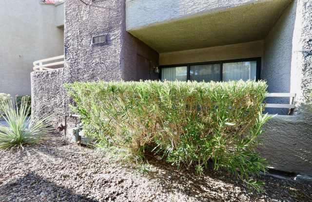 Welcome to easy Las Vegas living in this charming single-story condominium! Gallery 4