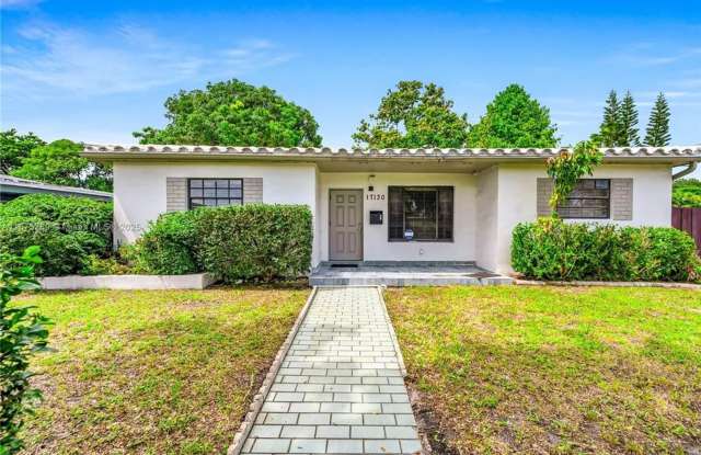 Spacious and well-maintained 3-bedroom, 2-bath single-family home on a corner lot in a convenient North Miami Beach location. photos photos