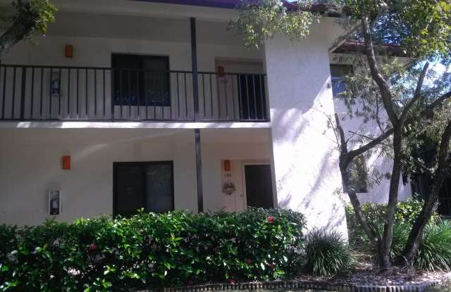 ***NEW PHOTOS COMING SOON***FANTASTIC VIEW - COVERED PARKING**TUCKED AWAY COMMUNITY***PEPPERWOOD OF NAPLES***CLOSE TO DOWNDOWN AND MARCO ISLAND*** photos photos