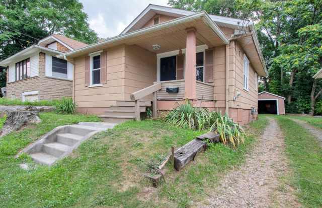 Charming 2 Bed / 1 Bath Home with Garage & Private Yard – 2212 Snyder Ave NE photos photos