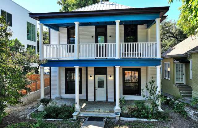 Spacious custom design 2 bed 1 bath Apartment for rent 709 W 14th st. photos photos