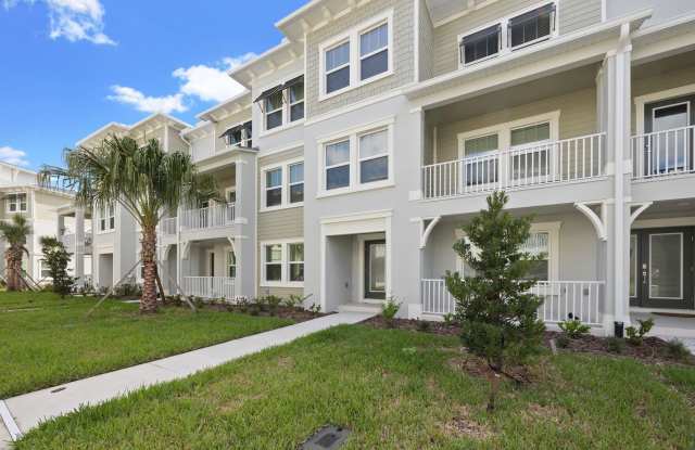 Beautiful New Three-Story Townhome in The Arbors at Wiregrass - 3463 Silent Gardens Cove, Wesley Chapel, FL 33543