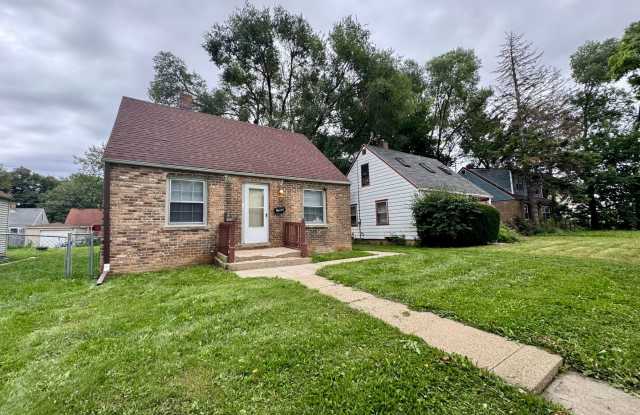Spacious 3BR Milwaukee Home | Additional Bonus Room | Large Yard | 1 Car Garage + 1 Car Parking Slab | Keyless Entry Locks photos photos
