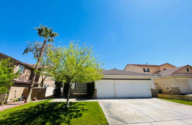 Single-story 4 Bed nestled in the desirable Green Valley Ranch! 3 Car Garage! photos photos