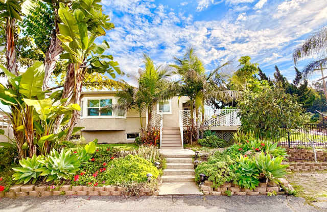 Beautiful Craftsman-style Home with fenced yard space, detached garage and additional parking in Vista! photos photos