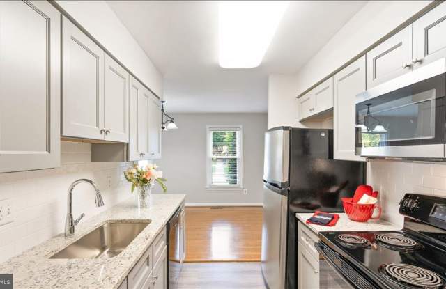 Welcome to 3148 Bayswater Court, a spacious 3-bedroom, 3.5-bath townhome tucked away in the desirable Villa D’Este Village community of Fairfax. Gallery 4