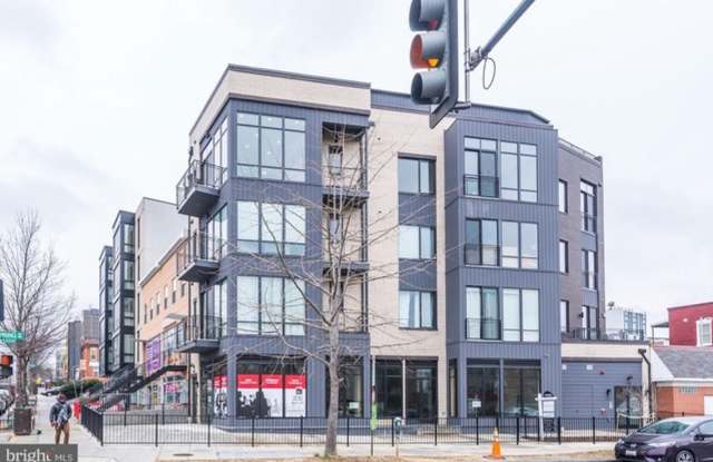 Stunning Contemporary two-level condominium with photos photos