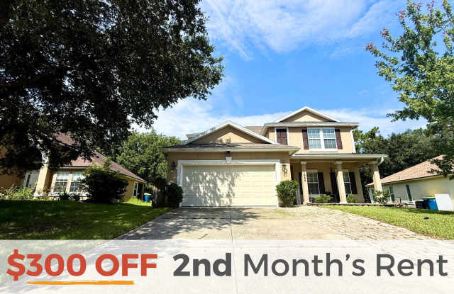 Spacious 4 Bed, 3.5 Bath Kernan Forest home, including a convenient main-floor bedroom with a full bath—perfect for guests! - 1644 Hammock Grove Lane, Jacksonville, FL 32225