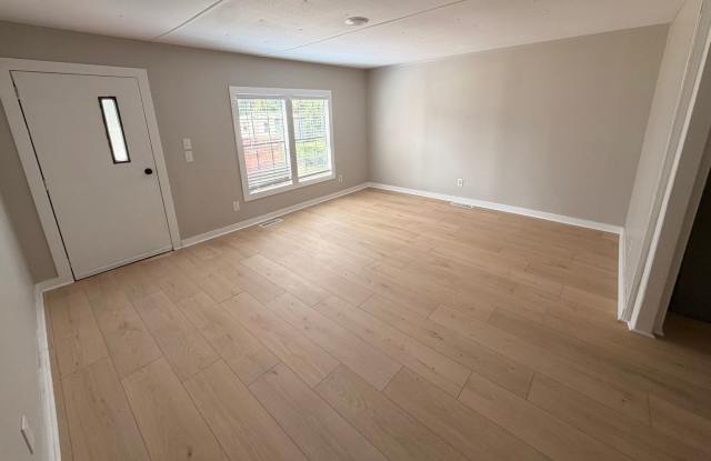 Spacious 4-Bedroom Home on a Private Wooded Lot with Screened Porch – $1,900/Month Gallery 3