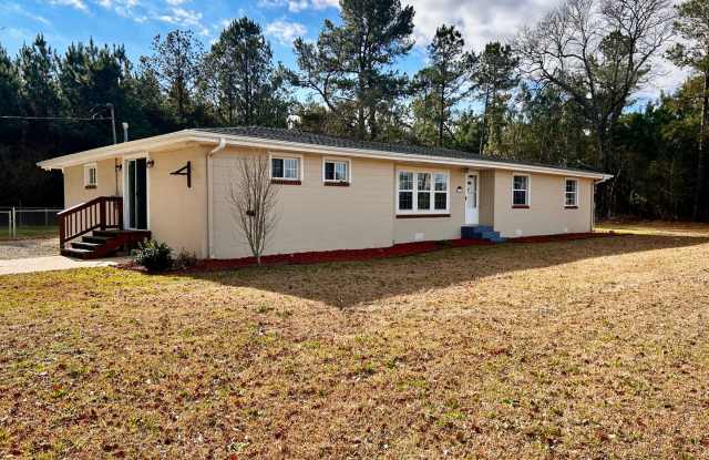 AVAILABLE NOW! 3 Bedrooms/1 1/2 Bath with Double living room space. photos photos