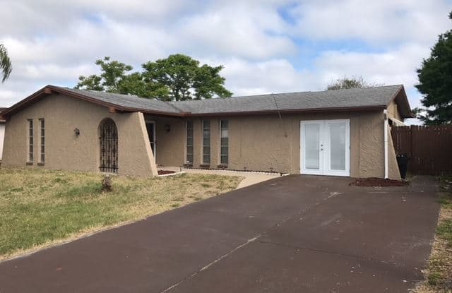 6841 Twilite Dr - 6841 Twilite Drive, Jasmine Estates, FL 34668