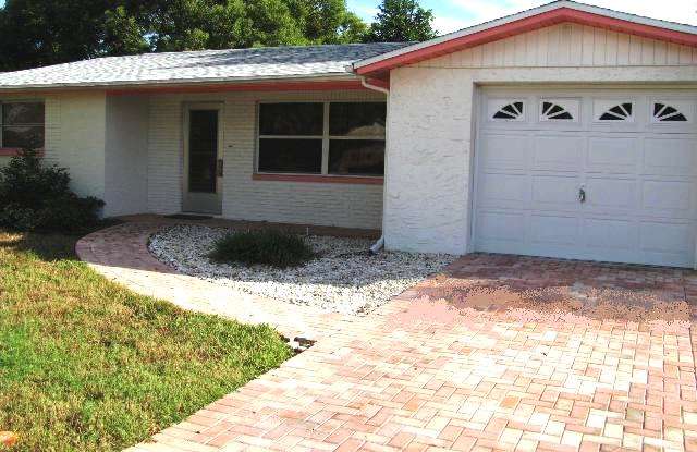 7040 Oakshire Drive - 7040 Oakshire Drive, Jasmine Estates, FL 34668