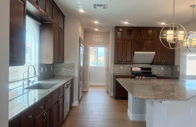 newer3-story home in southwest with Solar panel and EV car charger Gallery 3