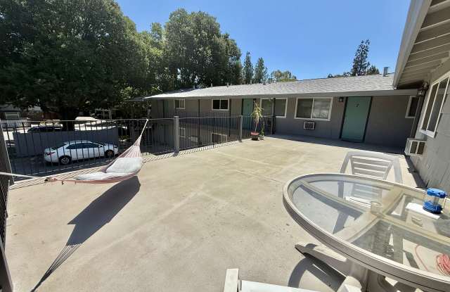 $500 OFF FIRST MONTH'S RENT Charming 2BR Apartment with Balcony  Covered Parking – Live Near It All! photos photos