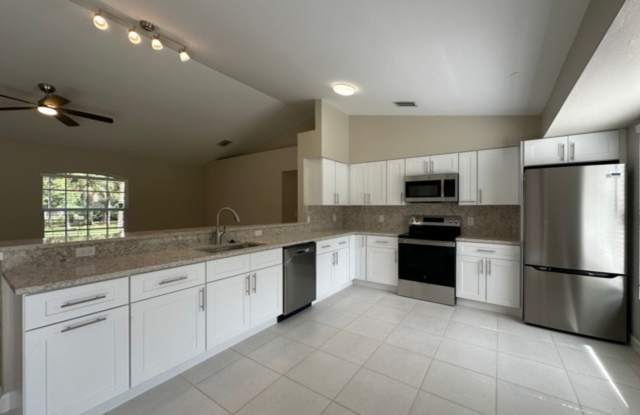 ANNUAL RENTAL - 3 Bedroom plus Den, 2 Bath Home in Golden Gate Estates off Golden Gate Blvd. photos photos