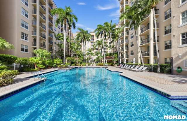 Spacious 2 Bed / 1 Bath Condo at Flagler Pointe – High Ceilings & 2 Parking Spots Gallery 1
