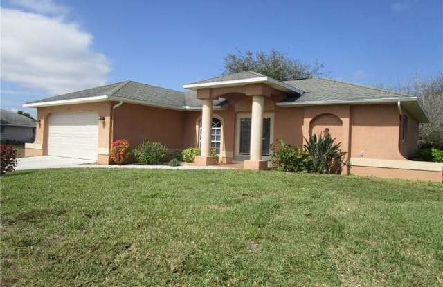 1225 NE 10th LN - 1225 Northeast 10th Lane, Cape Coral, FL 33909