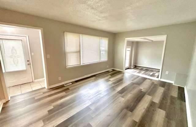 Lovely 3 Bedroom, 1.5 Bath with bonus room Available Now!-$1,500 with a one-year commitment and the 12th month free. Gallery 4