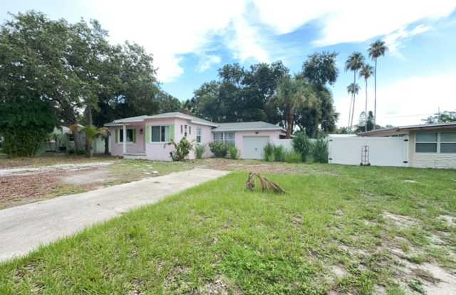 Charming Dunedin Retreat: 2BR Home with Sunroom  Garage! photos photos