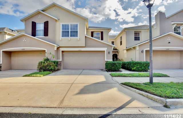 Beautiful 3/2.5 Spacious Townhome with a 2 Car Garage in the Gated Community Orchard - Winter Garden! photos photos