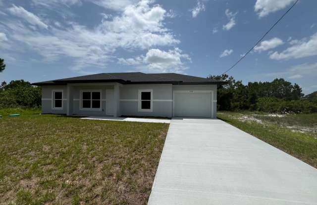 NEW CONSTRUCTION- Modern 3 Bed / 2 Bath Home in Lehigh Acres photos photos