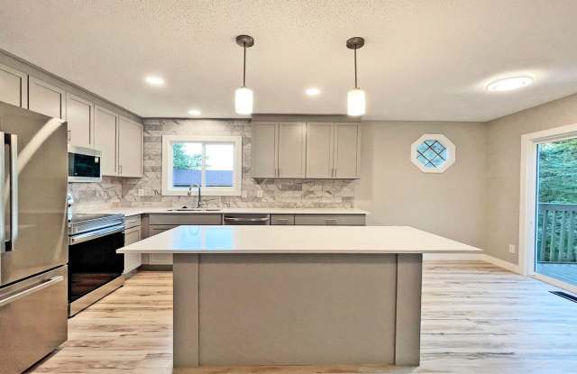 Sparkling Spacious New Home, Dream Kitchen, Fireplace, Large Deck, Family Room, Perfect Location, 196 Schools! Gallery 3