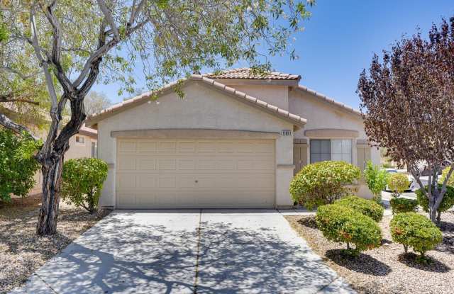 Spacious 4-Bedroom Home with Open Layout  Private Backyard in 89141 photos photos
